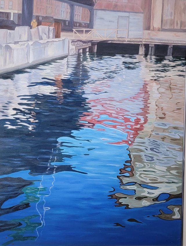 Barbara Carpenito's work, "South Street Seaport," combining both the history of her home town and her art, she says. "It is one view of the South Street Seaport area, painted in the 80s, when there were still some vestiges of a working seaport, before it was turned into a tourist attraction. Seaport businesses moved to Hunts Point, Bronx," she said. The painting is on display as part of "Archive: Stories from Storage," at the Wayne County Arts Alliance's Main Street Gallery.